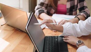 Group of Businesswoman and Accountant checking data document on laptop computer for investigation of corruption account Anti Bribery concept photo