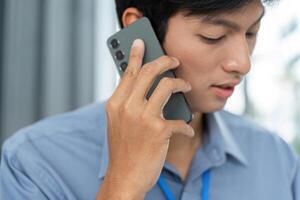 Remote Work and Digital Transformation. Professional on phone call discussing projects. photo