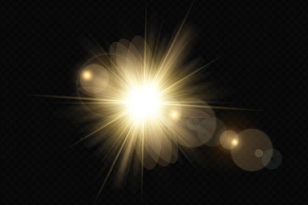 A golden light burst on a black background