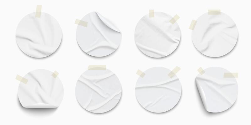 Round realistic white paper stickers with folds and adhesive tapes