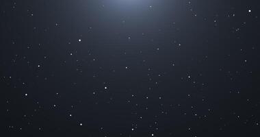 Slowly falling, swirling, and sparkling bokeh particles in white light against a dark background. Abstract snow. 41 video