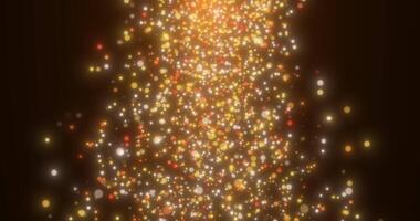 Falling golden sparkling particles on a black background. Abstract animation. video