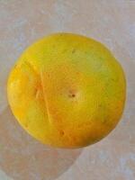 Pomelo, Jeruk Bali on a light surface. photo