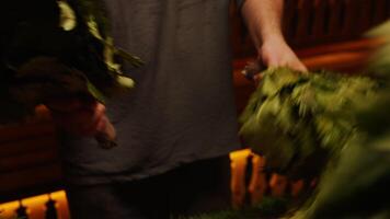 Professional Bath Attendant Massaging And Steaming Body By Oak Brooms, Closeup View Of Hands video