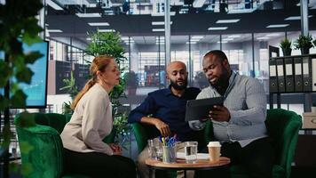 Group of empowered company leaders discuss corporate performance metrics, driven by vision and global investment strategy. International diverse business partners in conference. Camera A. video