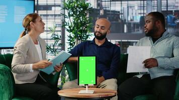 Confident CEOs group planning business development with isolated screen, analyzing performance and implementing decisions through structured analysis and leadership skills. Camera B. video