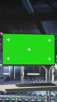 Vertical Mockup computer in high tech industrial data center used for AI system monitoring and performance tracking. Green screen PC overseeing server cabinets involved in computing operations video