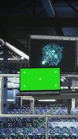 Vertical Server hub isolated screen laptop monitoring systems processing deep learning datasets for AI workflows. Mockup notebook tracking equipment supporting artificial intelligence model development video
