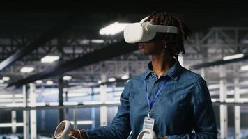Data center admin wearing VR headset using artificial intelligence neural networks technology. Server hub developer using AI programming language and virtual reality to update hardware, camera B video