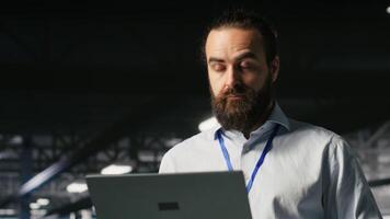 Data center admins monitoring artificial intelligence LLM visualization. Teamworking server room employees cooperating, overseeing rigs powering deep learning processes, camera B video