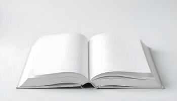 An open book with blank pages lies flat against a simple white background, ready for use. photo