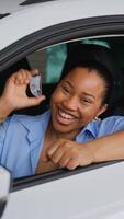Happy customer showing new car key video