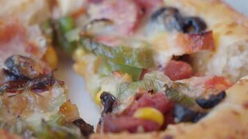Delicious pizza with savory toppings at local pizzeria video