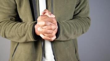 Person showing hands in a calm setting indoors video