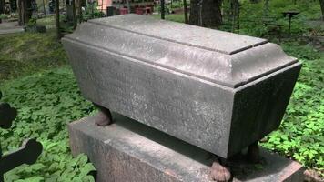 May 24, 2025, St. Petersburg, old cemetery, monument on the grave of a merchant 19th century, gravestone in the form of a coffin video