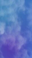 White clouds against a blue and purple sky. Suitable for backgrounds, naturethemed designs, inspirational content, weatherrelated graphics, and skythemed concepts creation. video