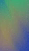 Vertical portrait of blurred green and blue gradient with raindrops. Suitable for naturethemed designs, backgrounds, environmental concepts, and peaceful visuals. video