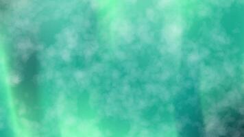 Cloudlike swirls of green and white form a mesmerizing abstract backdrop suitable for digital backgrounds, website banners, and artistic designs. video