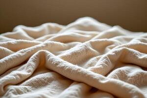 Soft Cream Colored Plush Blanket Texture Cozy Warm and Luxurious Fabric Drape photo