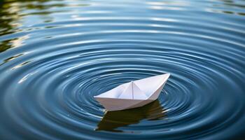 Serene Paper Boat Floating on Rippling Blue Water Tranquil Nature Scene photo