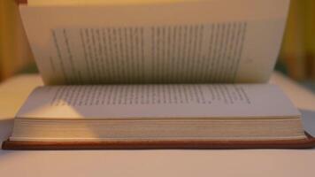 2 Open books to find information, educational ideas and research. video