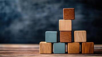 A stack of wooden blocks on a table photo