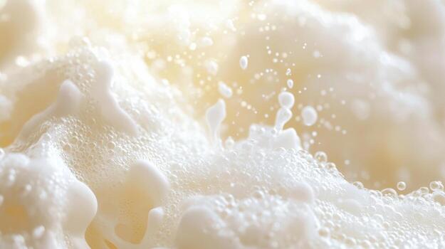 Close up of milk foam with bubbles photo
