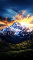 A beautiful mountain landscape with a sunset over it photo