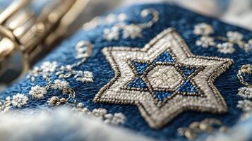A blue and white embroidered star of david photo
