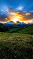 A beautiful sunset over a field of grass photo