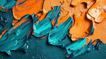 Bold strokes of orange and teal create a dynamic abstract composition. The thick paint application adds depth, reflecting artistic expression and vibrant energy photo