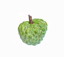 Isolated a fruit of Sugar apple on white background. It is a fruit that has rather round clusters of fruit. Each cavity inside the fruit has white flesh covering seeds. photo
