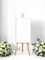 White easel with flowers on a white background photo