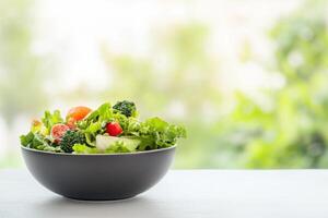 Fresh Salad Bowl with Greens, Tomatoes, and Broccoli Ready for Healthy Eating Choices photo