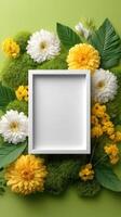 White frame surrounded by vibrant yellow and white flowers, lush green moss, and leaves on a light green background. Ideal for displaying art. photo