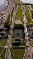 Aerial view of a highway with a bridge and a canal video