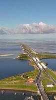 An aerial view of a highway and water video