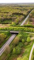 An aerial view of a highway and bridge video