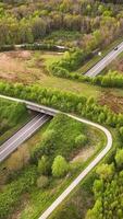 Aerial view of a highway with two bridges video