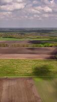 Aerial view of fields and farmland in the spring video