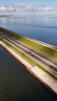 A highway that runs along the coast of the ocean video