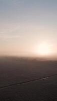 Aerial view of a foggy field at sunrise video