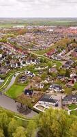 Aerial view of a residential area with houses and a river video