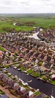 Aerial view of a residential area with houses and a canal video