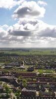 Aerial view of a residential area with a few houses and a field video