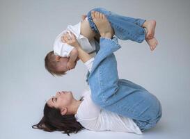 A mother and son duo pulls a series of silly faces for the camera. photo