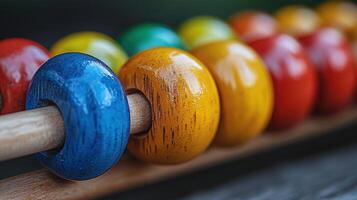 a close up of a wooden abacus with colorful beads photo