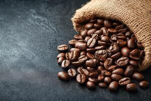 coffee beans in a sack on a black background photo