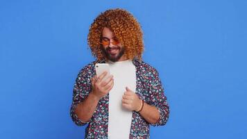 Man use smartphone typing new post on web, browsing searching positive application game feedback video