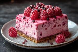 a piece of raspberry cheesecake on a plate photo